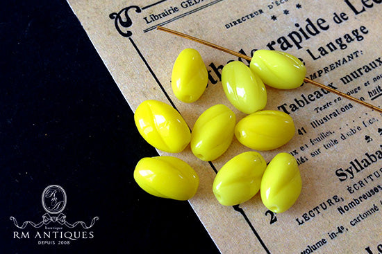 VP-2183 11x7mm West German Vintage Twisted Yellow glass Bead